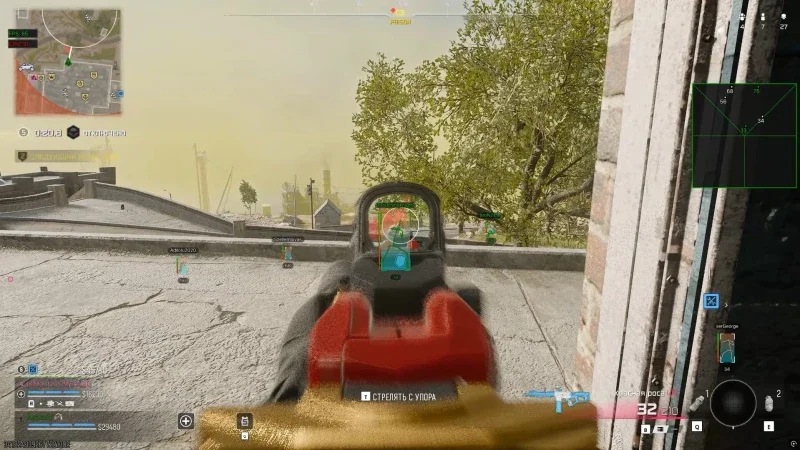 Weapon optic centered on a red highlighted player with a radar grid at the right